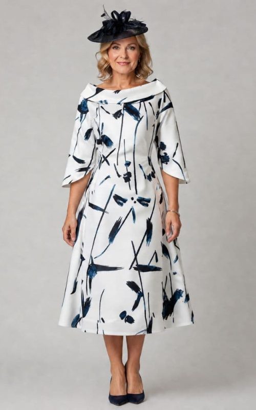 Model wearing L-19SS-2860-34 occasion dress in navy/white.