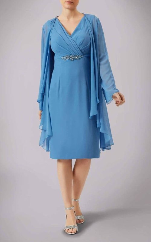 Model wearing Mascara powder blue occasion dress with jacket.
